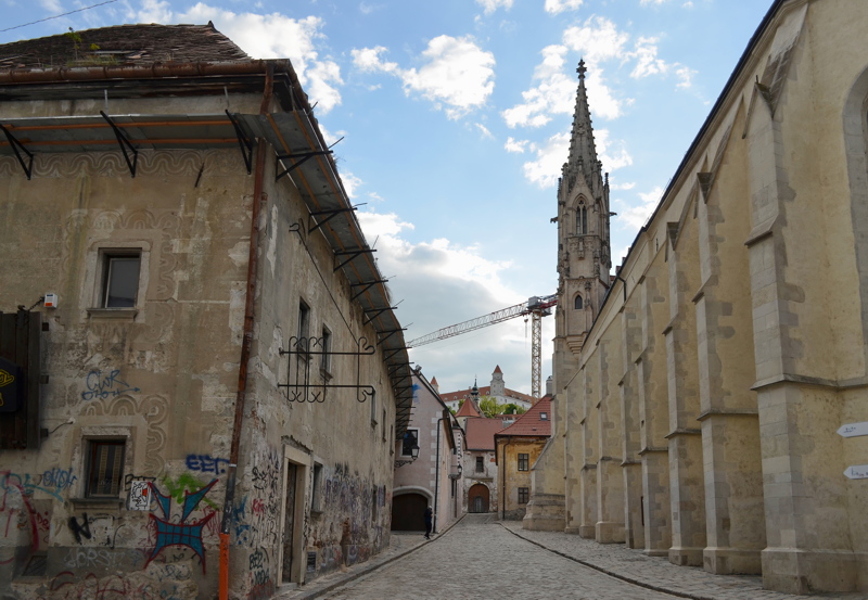 Cobbled street in the Old Town of Bratislava, looking toward the Clarissine Church